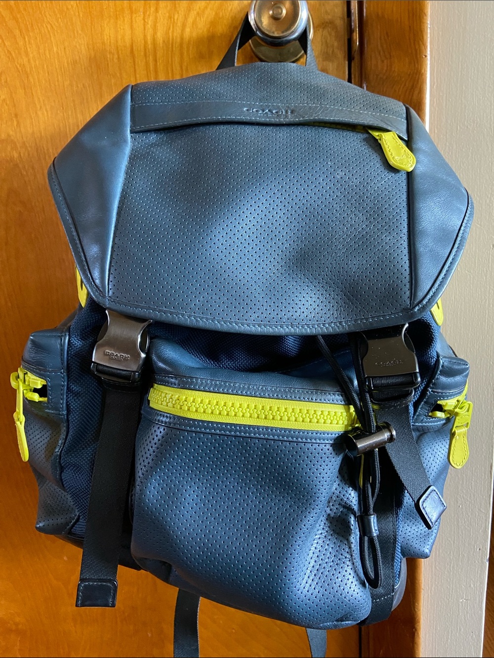 Coach Navy Leather Backpack with Yellow Accents